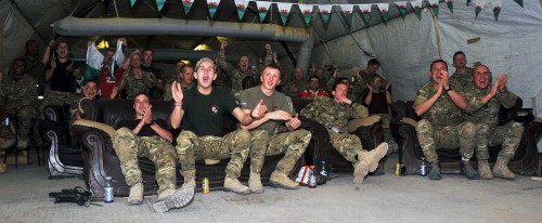 Soldiers from all around Wales have returned from operations on the front line to support their rugby team while in Afghanistan.