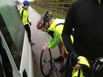 A puncture threatens to set the team back, but they were soon on the road again.