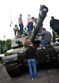 Families and friends get up close and personal with a Challenger II main battle tank on the Dettingen weekend in June.