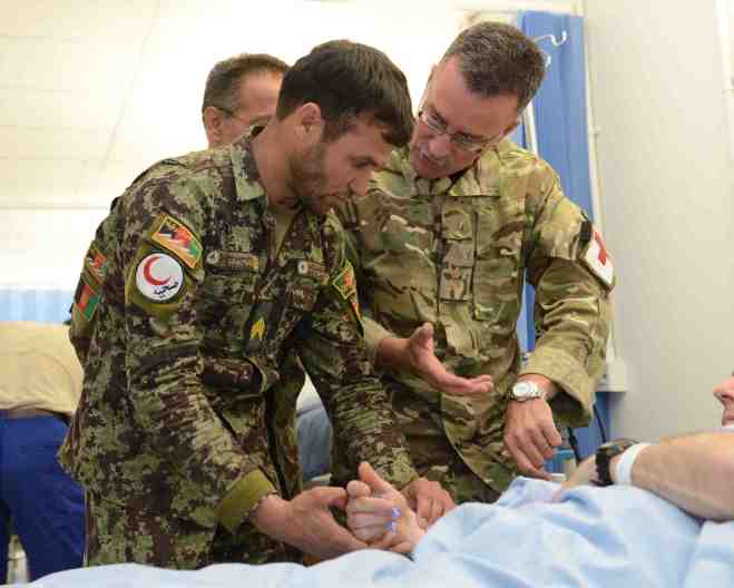 ISAF are teaching the afghan doctors and surgeons more advanced medical techniques to enable them to look after and care for the more seriously injured soldiers. Sgt Barry Pope RLC (Phot)
